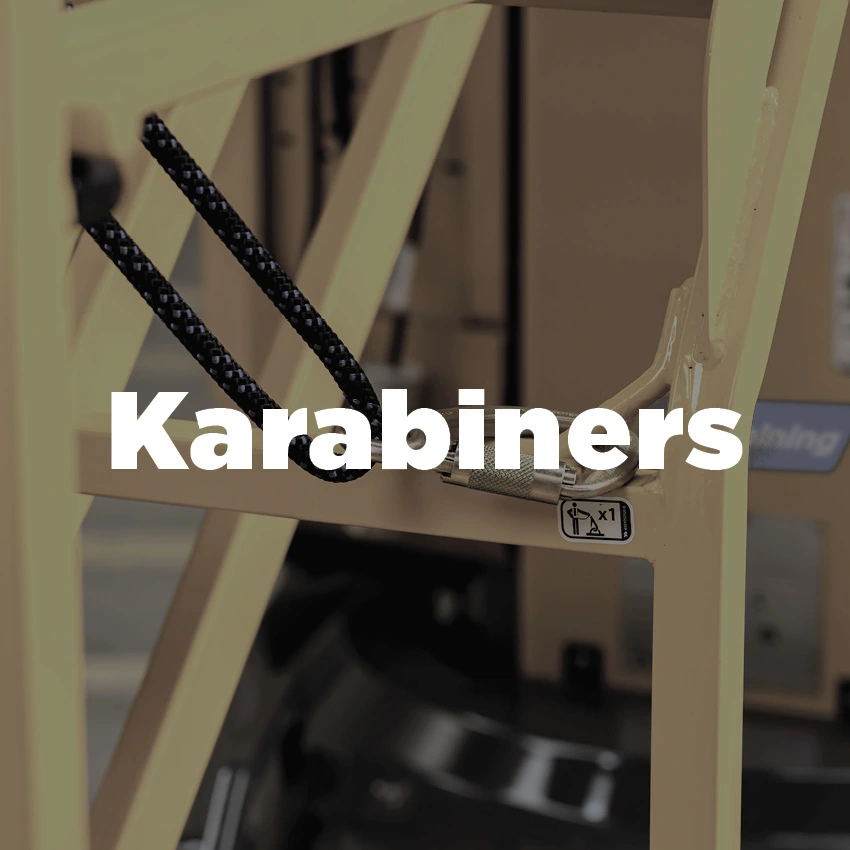 Close up of a karabiner connected to a yellow MEWP cradle